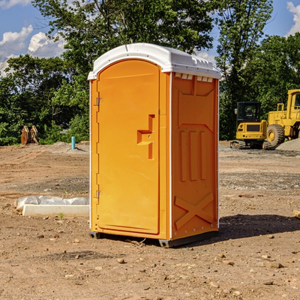 what is the cost difference between standard and deluxe portable restroom rentals in Aurora ME